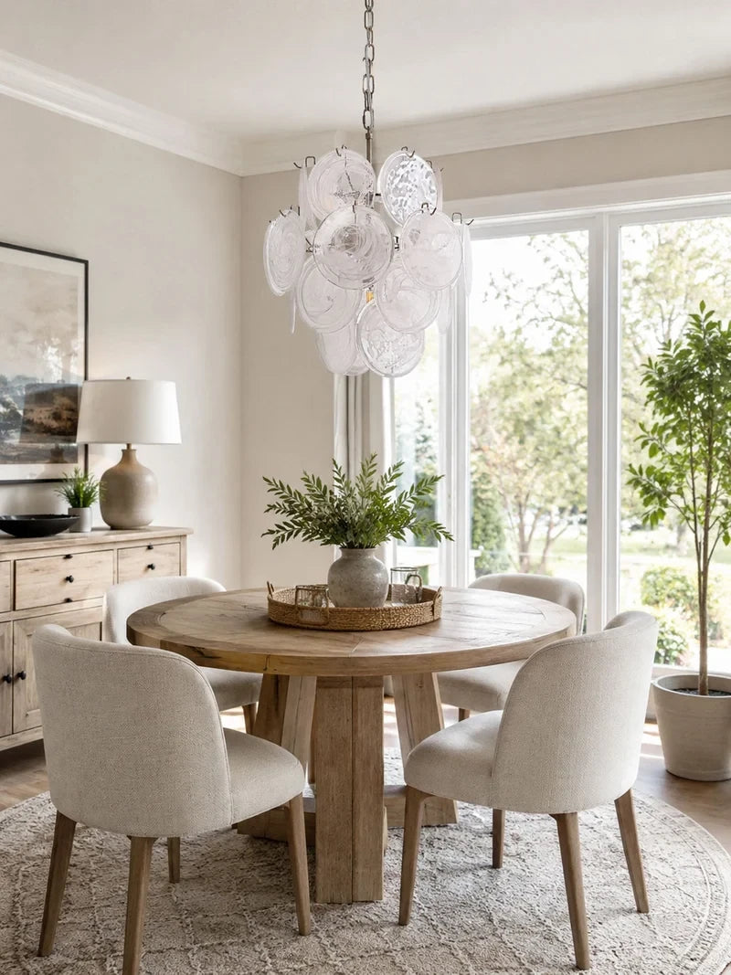 Modern White Disc Art Glass Chandelier Over Round Dining Table