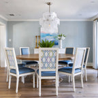 Modern White Disc Art Glass Chandelier in Elegant Dining Setting