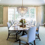 Modern Multi-Tier Crystal Chandelier Over Dining Room Table