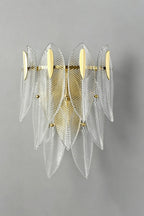 Illuminated Modern Brass and Feather Art Glass Wall Sconce Studio Shot
