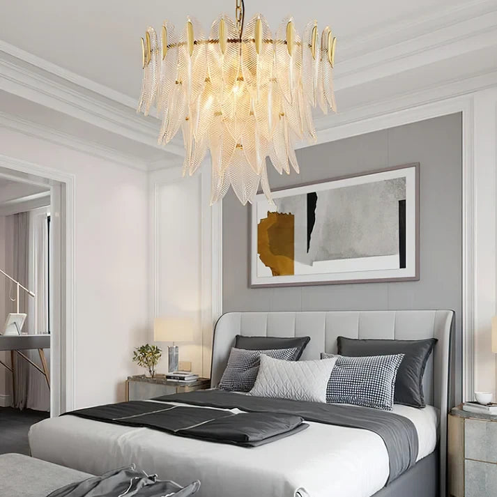 Modern Brass Feather Chandelier in Master Bedroom Interior