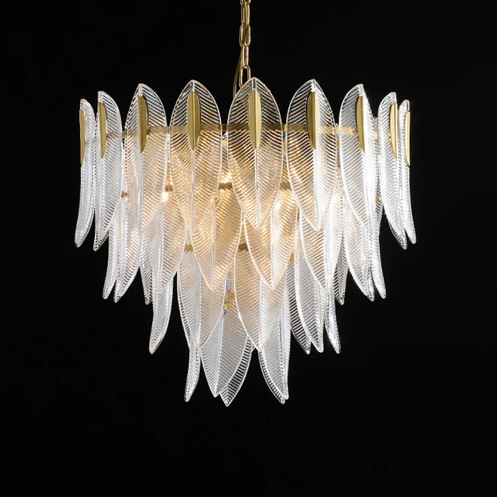 Illuminated Modern Medium Brass Feather Chandelier on Black Background