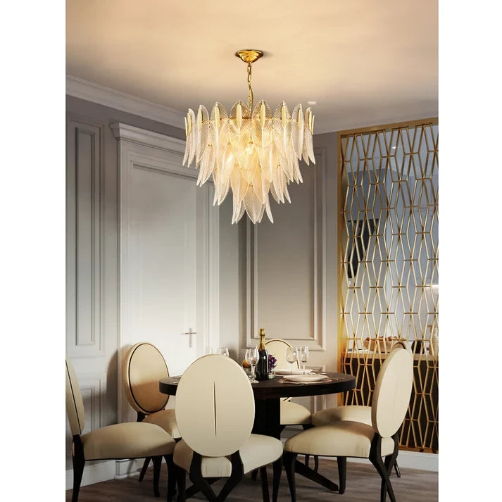 Modern Brass Feather Chandelier Over Dining Table