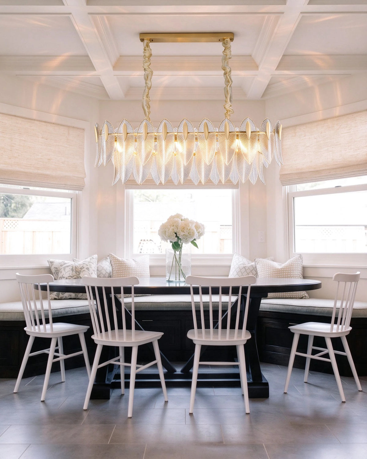 Modern Brass Linear Feather Chandelier Over Dining Nook