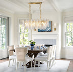 Modern Linear Feather Art Glass Chandelier Over Round Dining Table