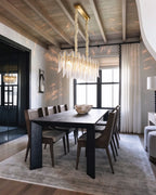 Modern Brass Linear Feather Chandelier in Luxury Dining Space