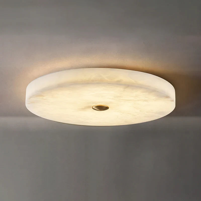 Angled View of Illuminated Modern Flat Round Alabaster Ceiling Light