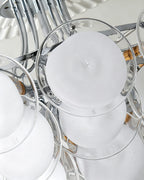 Upward View of Modern White Disc Art Glass Ceiling Light Interior Lighting Structure