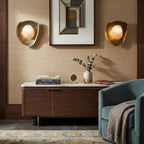 Modern Organic Pebble Sconces Flanking Artwork Over Sideboard