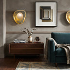 Pair of Gold Foil Organic Sconces Flanking Living Room Art