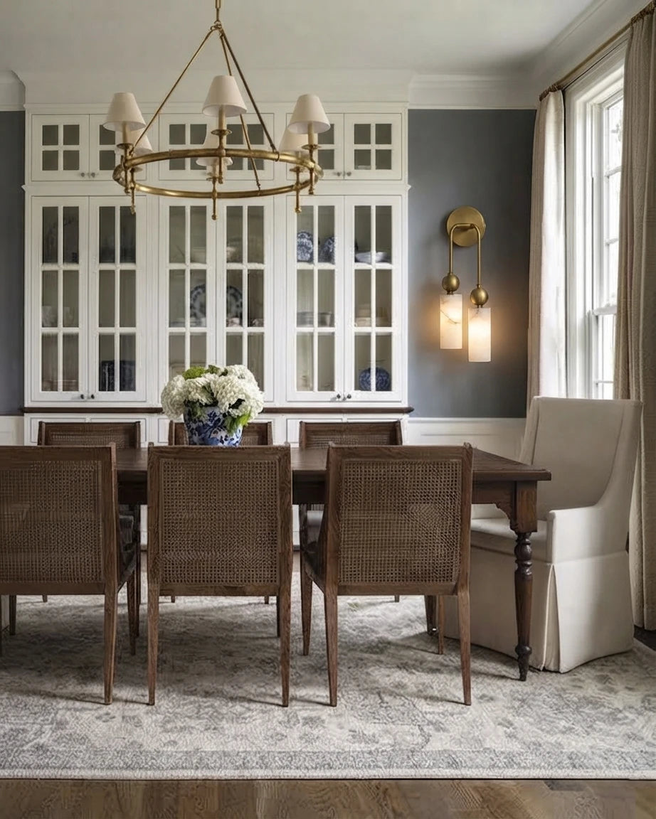 Modern Brass Cylinder Wall Sconce in Dining Area