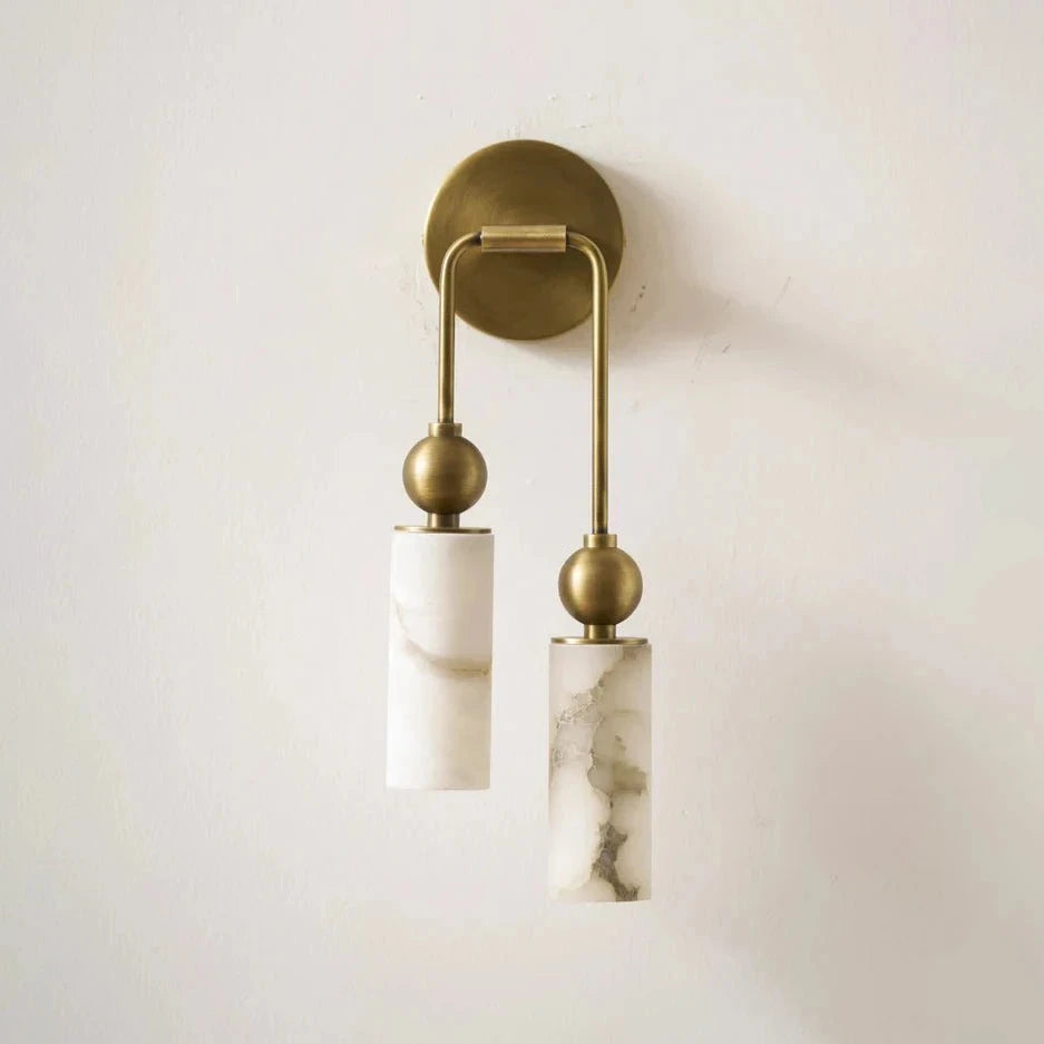 Illuminated Modern Asymmetrical Marble Wall Sconce Studio Shot