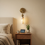 Modern Brass Wall Sconce in Bedroom Setting