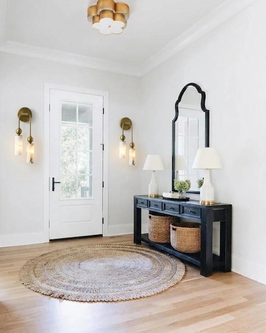 Modern Brass Wall Sconce in Bright Entryway Foyer