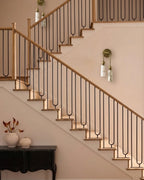 Modern Brass and Alabaster Wall Sconce in Staircase Hallway
