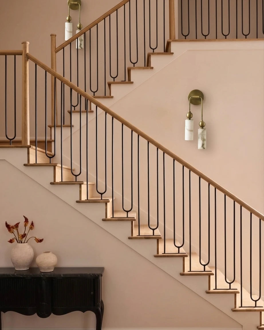 Modern Brass and Alabaster Wall Sconce in Staircase Hallway