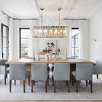 Modern Crystal Prism Linear Chandelier Over Long Dining Table