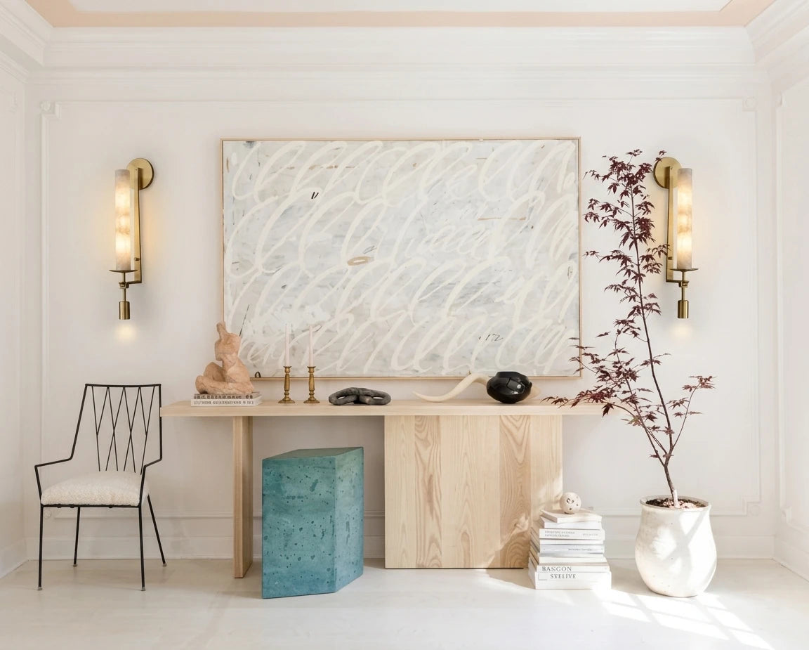 Modern Alabaster Wall Sconces Over Living Room Console Table
