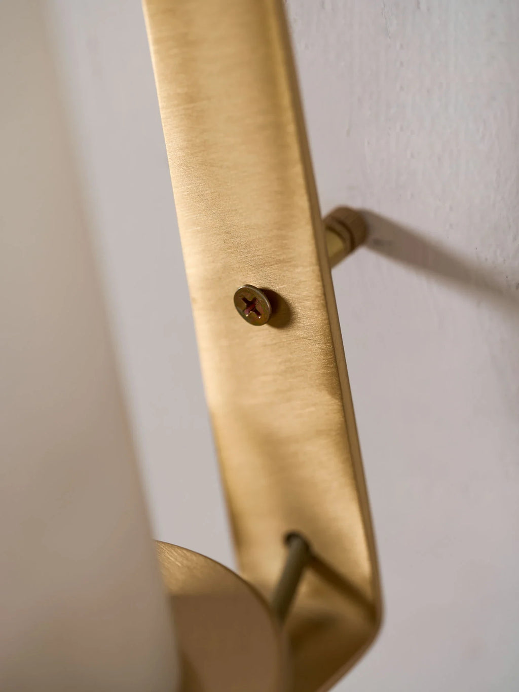 Detail View of Brass Mounting Bracket and Support Stem