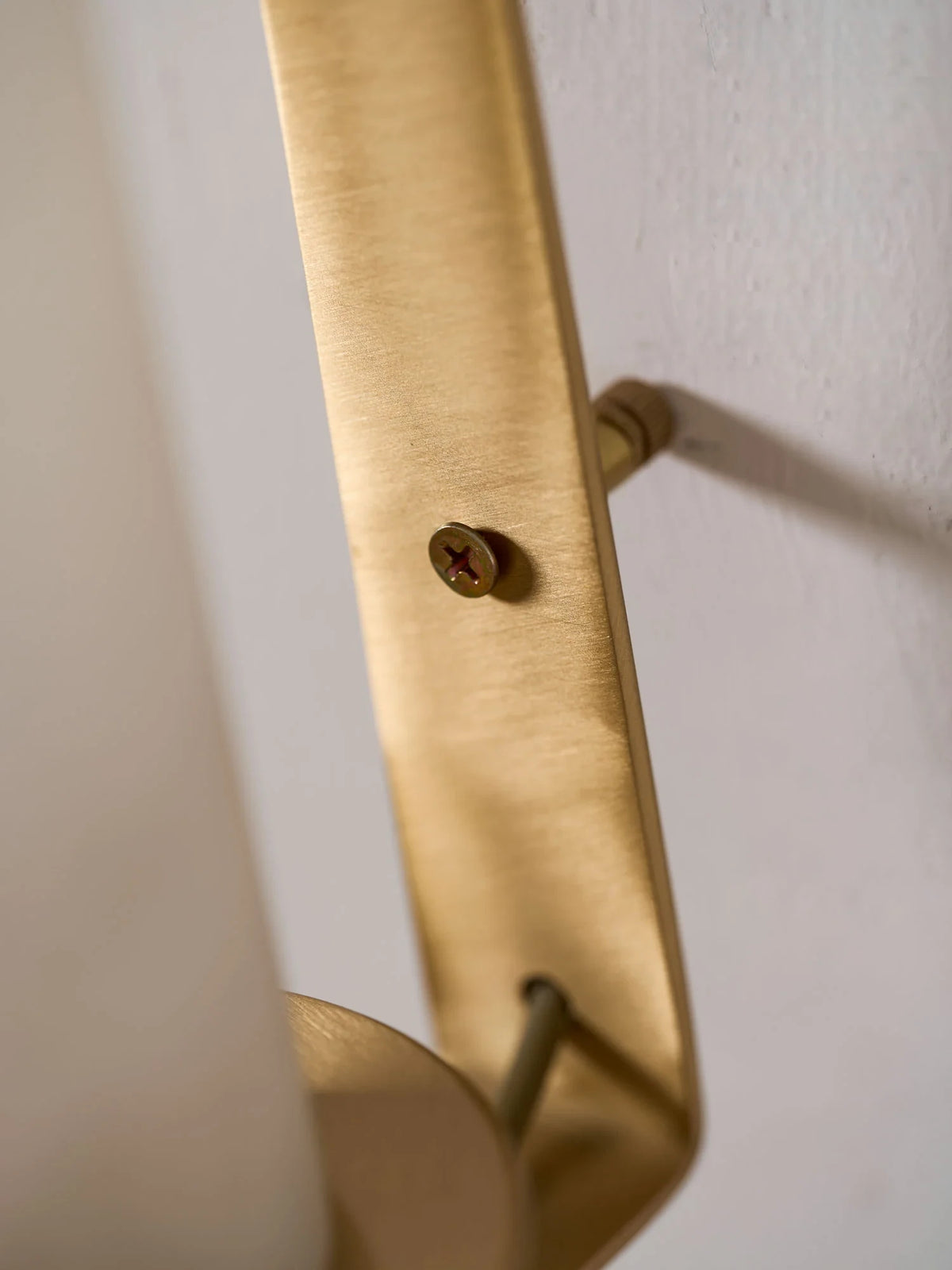 Detail View of Brass Mounting Bracket and Support Stem