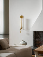 Modern Double Cylinder Alabaster Wall Sconce Over Fireplace Setting