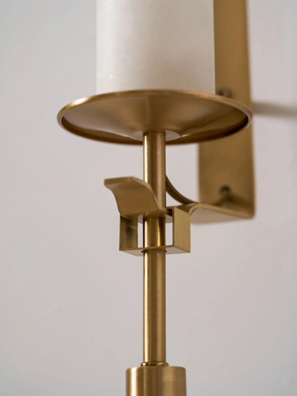Close Up View of Brass Holder and Fixture Hardware on Wall Sconce