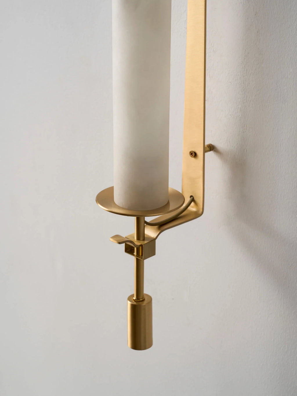 Close Up View of Alabaster Stone Cylinder and Brass Support Tray