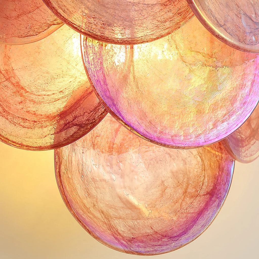 Close Up View of Pink Colorful Disc Glass Texture and Light Pattern