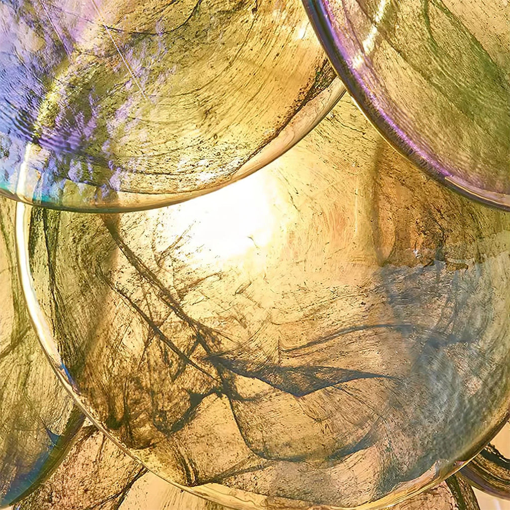 Close Up View of Illuminated Green Colorful Disc Wall Sconce