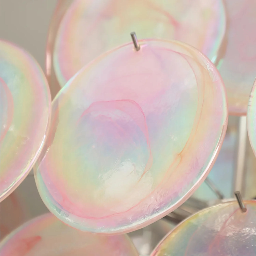 Close Up View of Pink Iridescent Round Disc Glass Texture and Glowing Edges