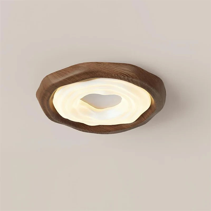Angled View of Illuminated Modern Organic Wood Ceiling Light