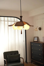 Modern Wood and Glass Pendant Light in Cozy Living Space