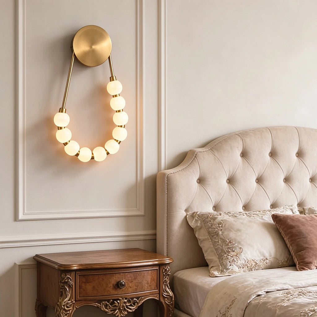 Modern Brass Beaded Wall Sconce in Elegant Master Bedroom