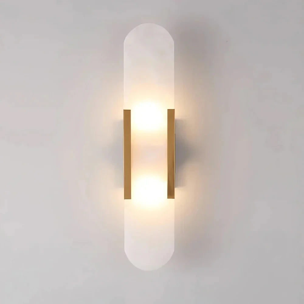Angled View of Illuminated Modern Capsule Alabaster Wall Sconce