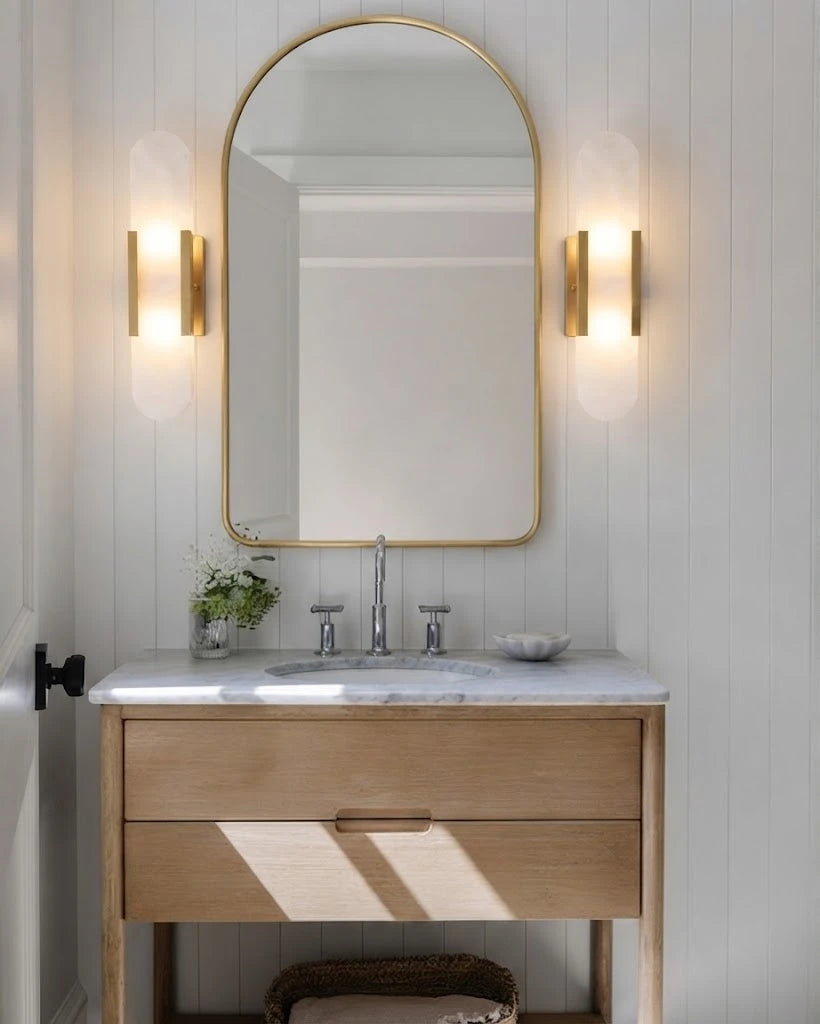 Modern Capsule Alabaster Art Glass Wall Sconces in Bathroom Vanity Setting