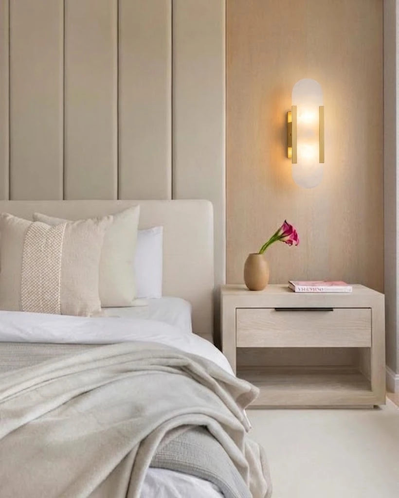 Modern Capsule Alabaster Wall Sconces Over Master Bedside