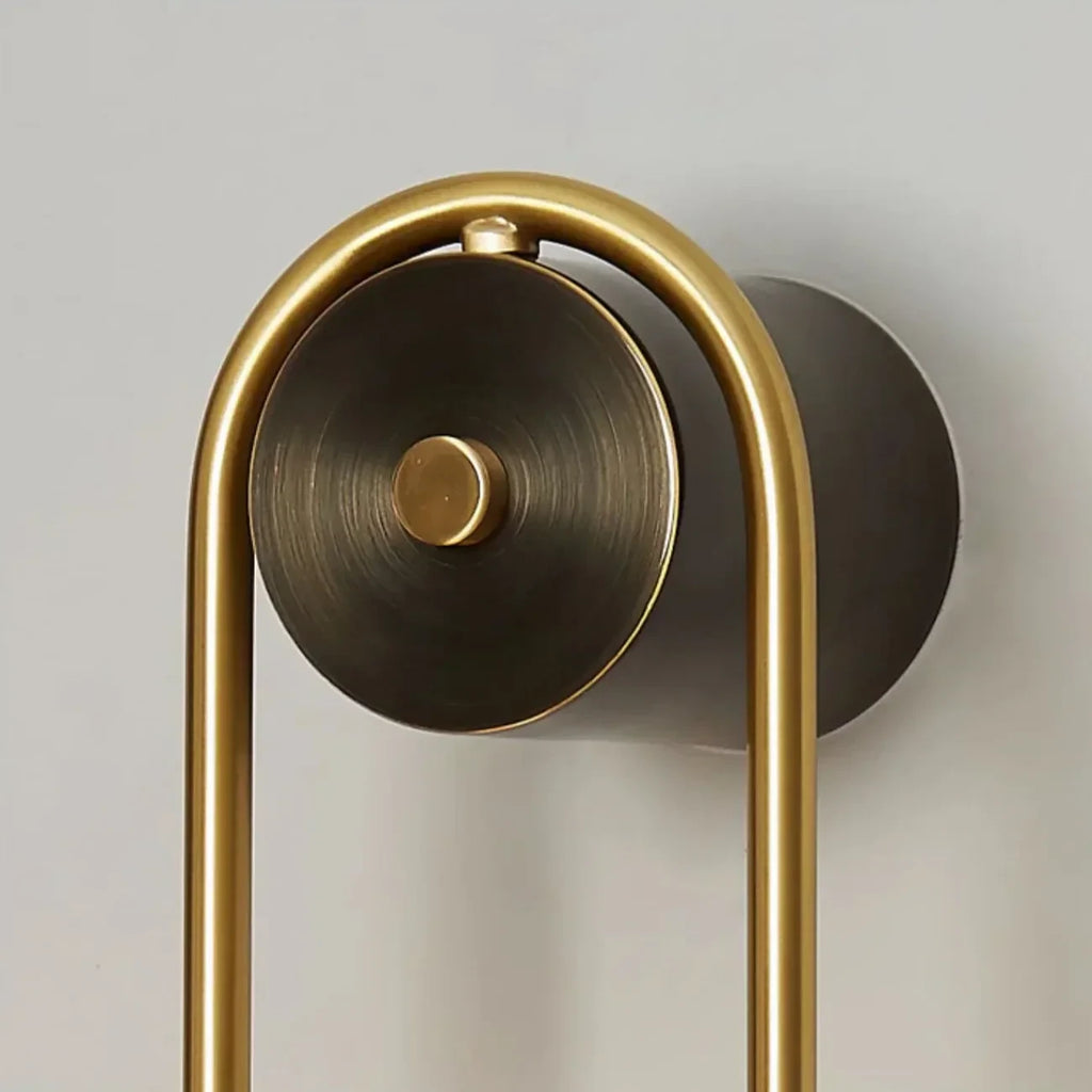 Close Up View of Brass Canopy Mount and Curved Tube Connection Details