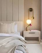 Modern Brass Globe Wall Sconce in Elegant Master Bedroom