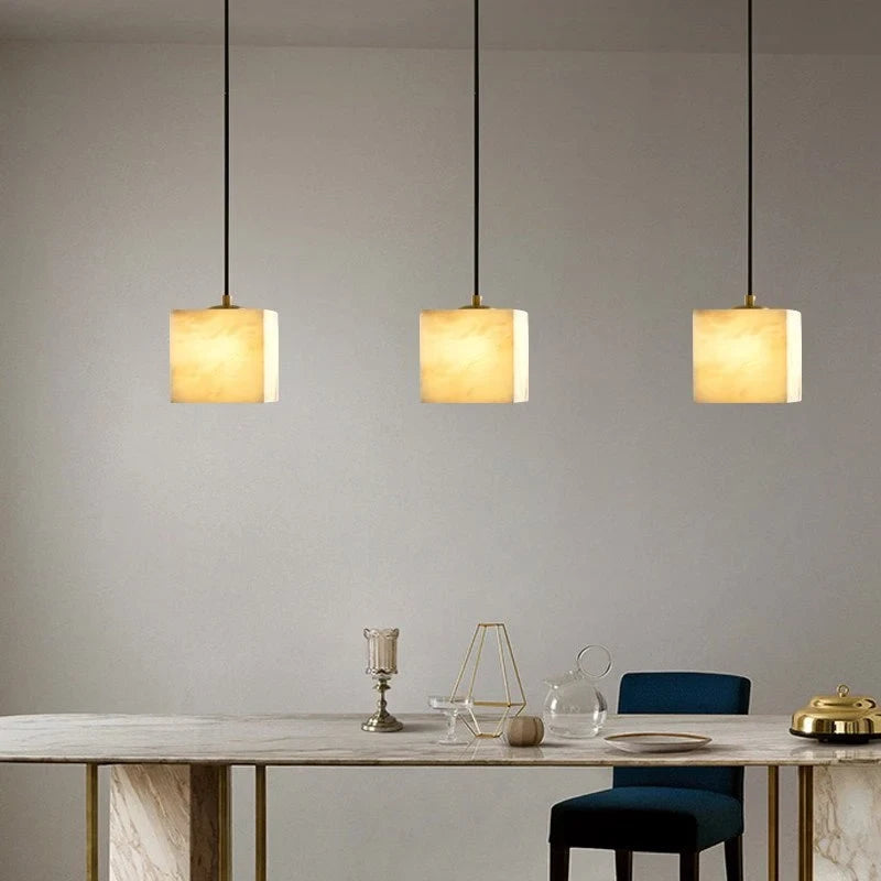 Modern Cube Alabaster Pendant Lights Over Dining Room Table