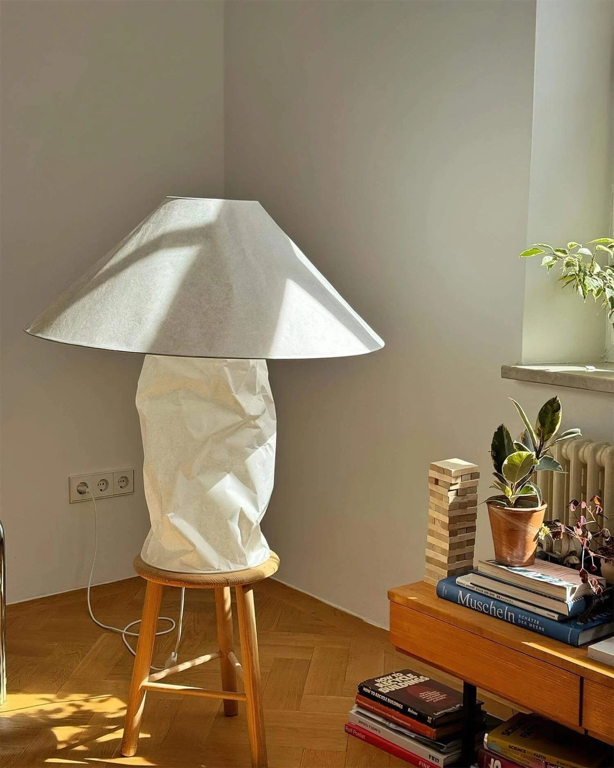 Modern Pleated Paper Accent Table Lamp in Corner Setting