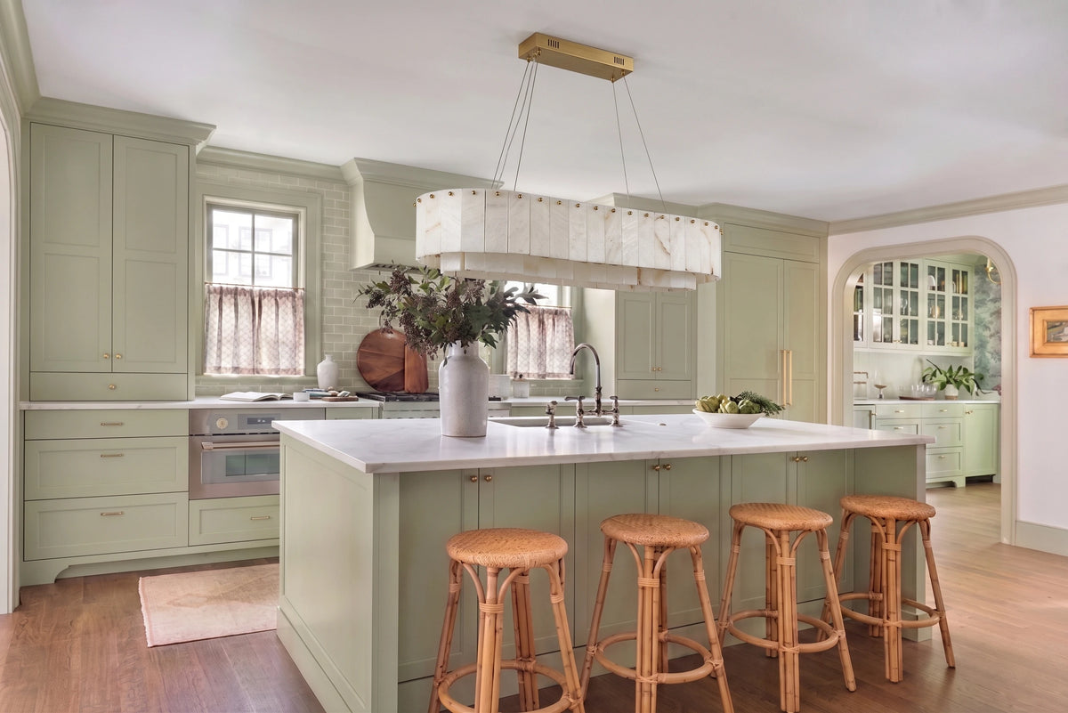 Alabaster Oval Linear Pendant Light Over Kitchen Island