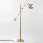 Modern Balance Arm Smoked Glass Globe Floor Lamp Studio Full Shot