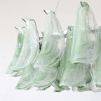 Close Up View of Green Gradient Feather Glass Texture and Light Pattern