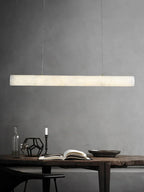 Modern Alabaster Art Glass Linear Pendant in Moody Interior Setting