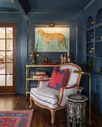 Modern Black and Brass Picture Light Over Painting in Living Room