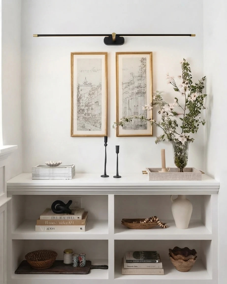 Modern Black Picture Light Over Framed Art in Hallway