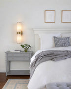 Modern Dual-Cylinder Wall Sconce in Master Bedroom