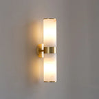 Angled View of Illuminated Modern Dual-Cylinder Wall Sconce
