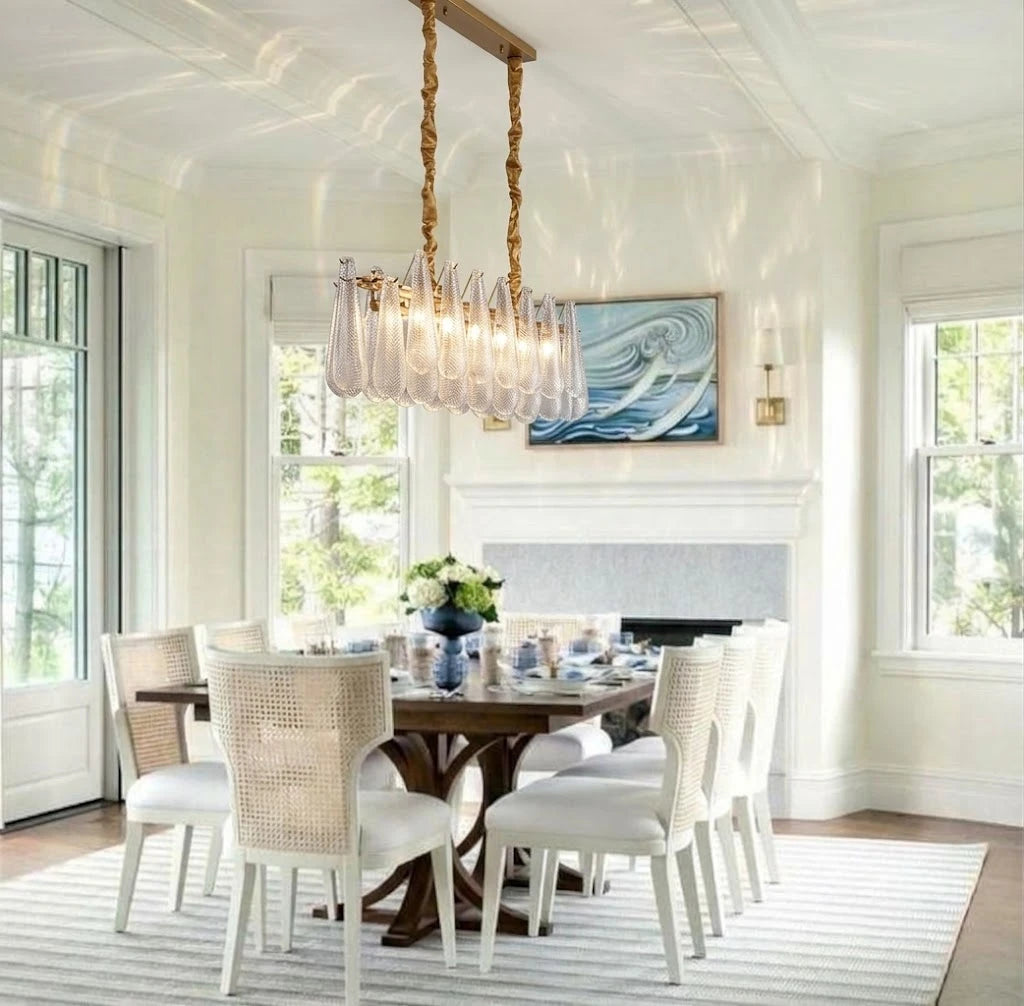 Modern Linear Chandelier Over Dining Table Near Window Light