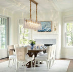 Modern Linear Chandelier Over Dining Table Near Window Light